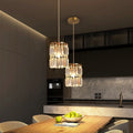 Guldtonad kristallpendel – Liten form, elegant uttryck